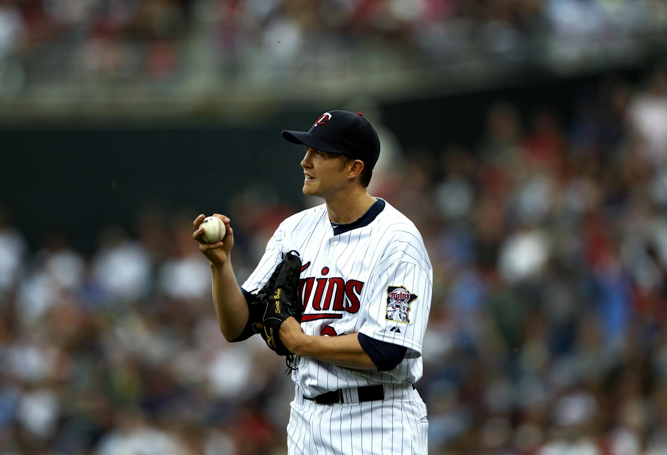 Twins starter Scott Baker gave up four runs Sunday in a 5-3 to Oakland, but walks have hurt the Twins more this season.