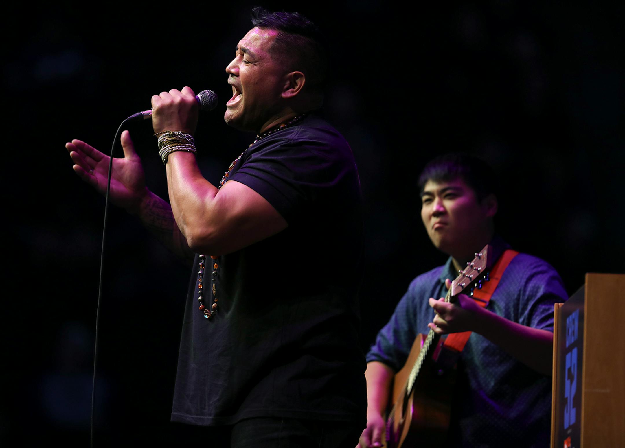 Esera Tuaolo, the former Viking and current contestant on "The Voice" entertained the volunteers with a song during the program Sunday.