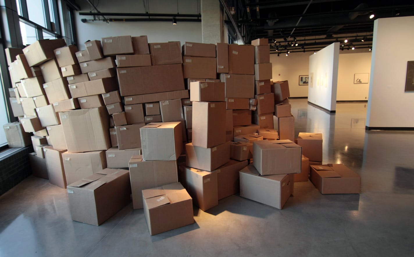 Nash Gallery, U of M,- " Dig Through" by David Donovan, a labyrinth of cardboard boxes.