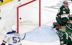 David Perron (57) of the St. Louis Blues gets the puck past Minnesota Wild goalie Marc Andre Fleury (29) for a goal in the third period Monday, May 2,