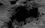 The May 21, 2016 photo released by the European Space Agency ESA shows the surface of Comet 67P/Churyumov-Gerasimenko. The photo was taken by the the 