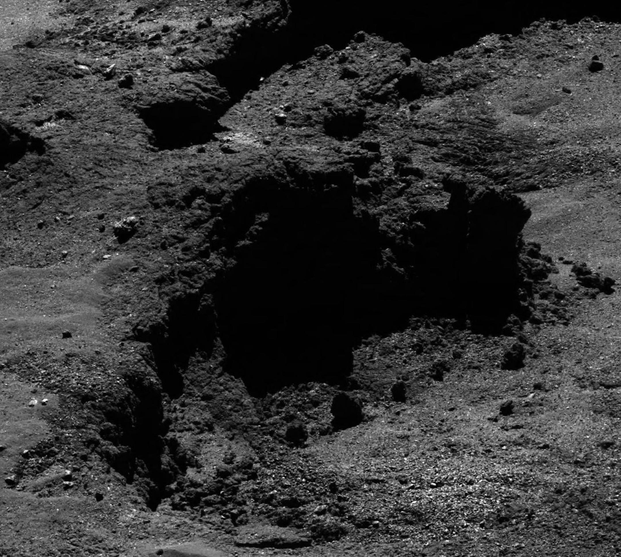 The May 21, 2016 photo released by the European Space Agency ESA shows the surface of Comet 67P/Churyumov-Gerasimenko. The photo was taken by the the OSIRIS narrow angle camera of the Rosetta space probe from a distance of 7.440 km from the comet. Scientists say they have detected glycine and phosphorus in the dusty envelope around a comet, supporting the theory that comets 'delivered' key chemicals necessary for the emergence of life on Earth. (ESA/Rosetta/MPS for OSIRIS Team via AP)