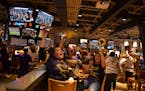 Fans at Buffalo Wild Wings in Mankato roared after Minnesota State, Mankato scored a goal in the first period of Saturday’s NCAA Frozen Four champio