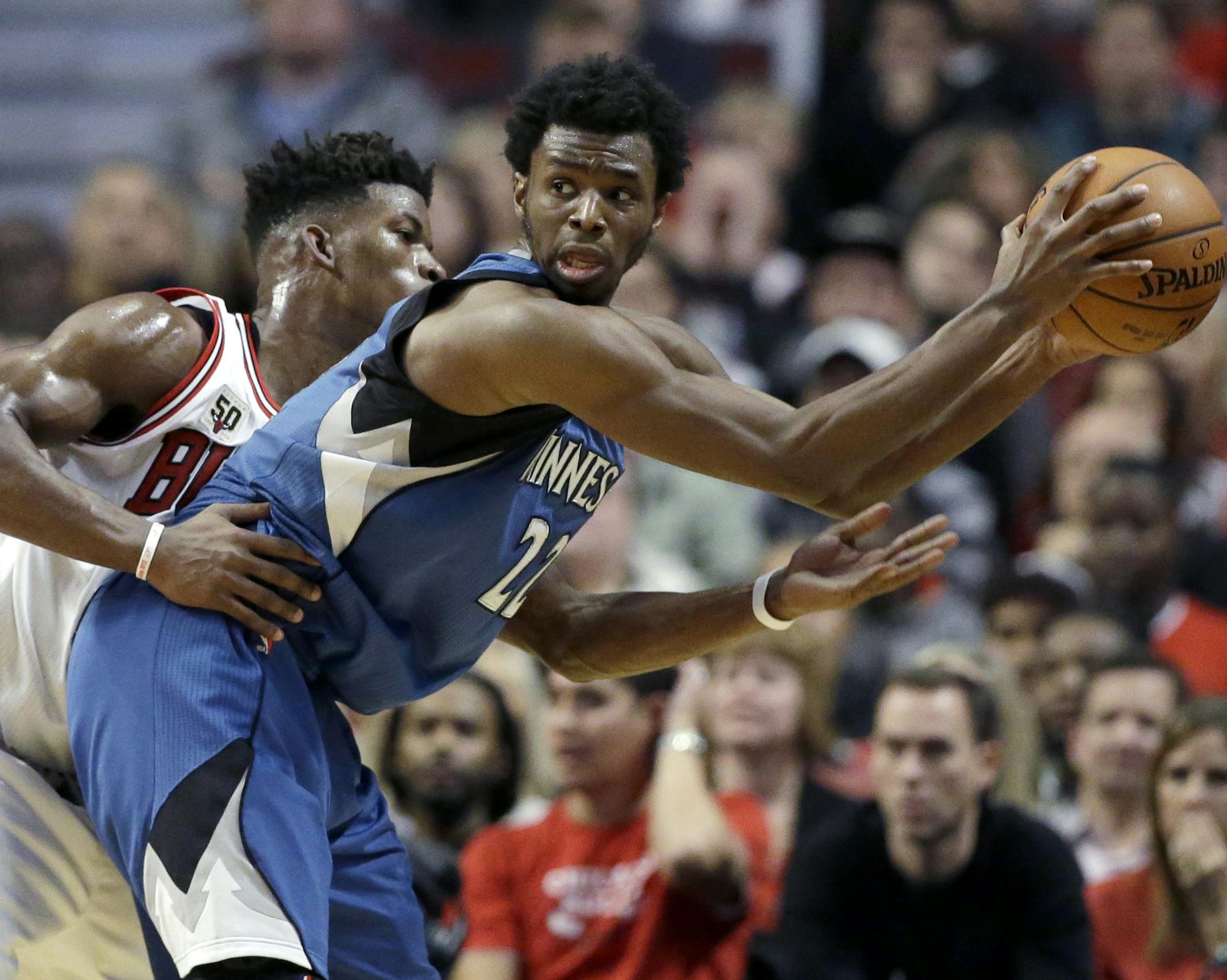 Timberwolves guard/forward Andrew Wiggins, right