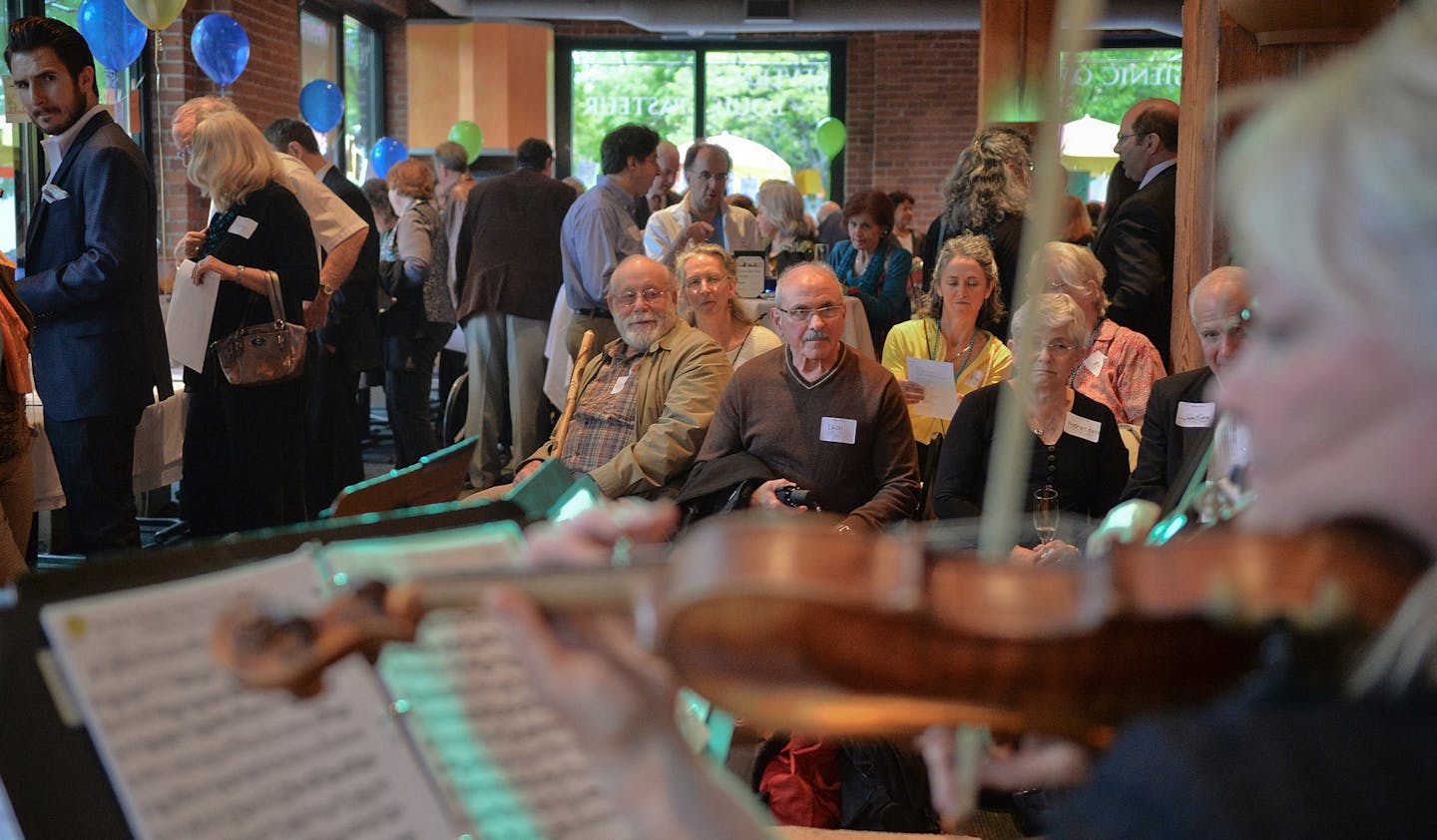 Spring Fling guests were treated to live music at Vic's during the Minnesota Sinfonia fundraiser. ] (SPECIAL TO THE STAR TRIBUNE/BRE McGEE) **Minnsesota Spring Fling, Minnesota Sinfonia ORG XMIT: MIN1505251455540520