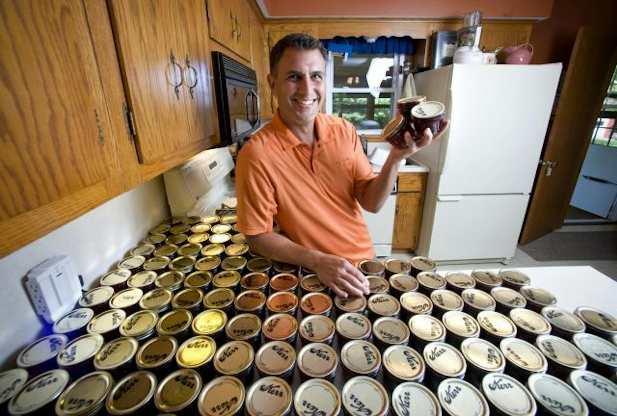 Paul Blom, owner and CEO of Right at Home, with one of five batches of rhubarb jam he makes at home over successive weekends. He gives a jar to each of his company's clients. Right at Home came in third on the list.