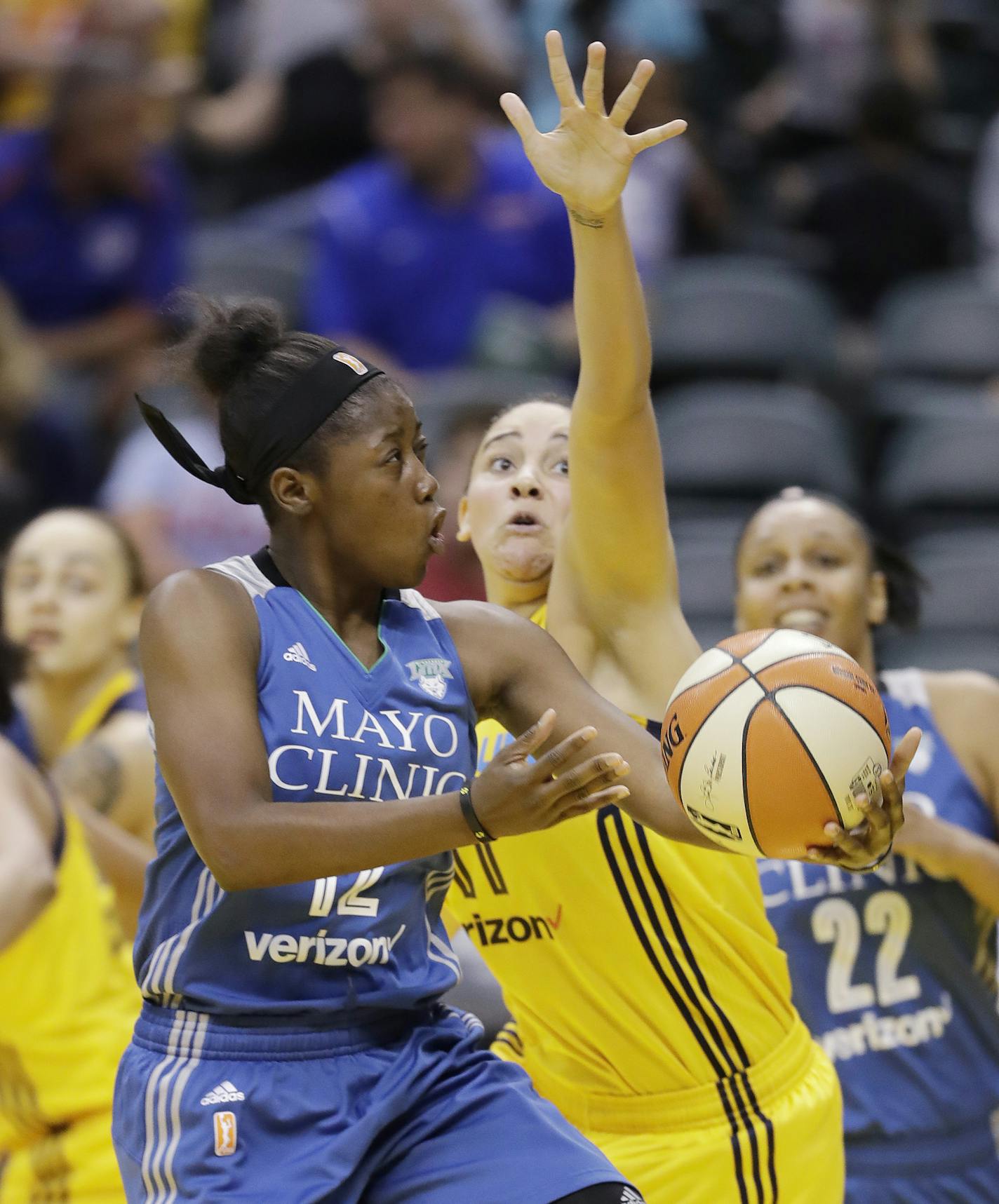 Minnesota Lynx's Alexis Jones puts up a shot against Indiana Fever's Natalie Achonwa during the first half of a WNBA basketball game Wednesday, Aug. 30, 2017, in Indianapolis. (AP Photo/Darron Cummings)