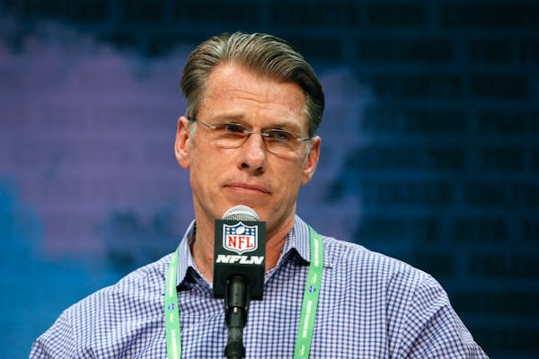 FILE - In this Feb. 25, 2020, file photo, Minnesota Vikings general manager Rick Spielman speaks during a press conference at the NFL football scoutin