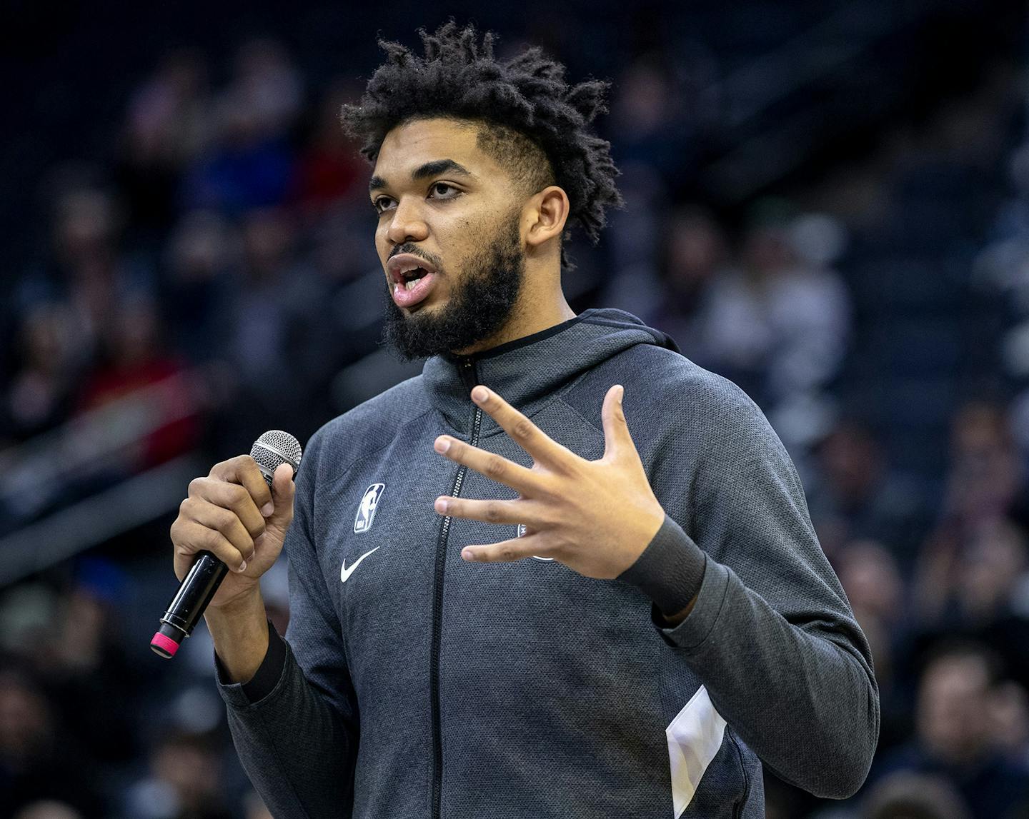 Minnesota Timberwolves center Karl-Anthony Towns addresses the crowd at Target Center about Kobe Bryant and his daughter Gianna before the start of Monday night's game on Jan. 27, 2020 at the Target Center in Minneapolis, Minn. Towns said Wednesday that his mother is in the hospital battling COVID-19. (Carlos Gonzalez/Minneapolis Star Tribune/TNS) ORG XMIT: 1616864 ORG XMIT: MIN2003251336183293