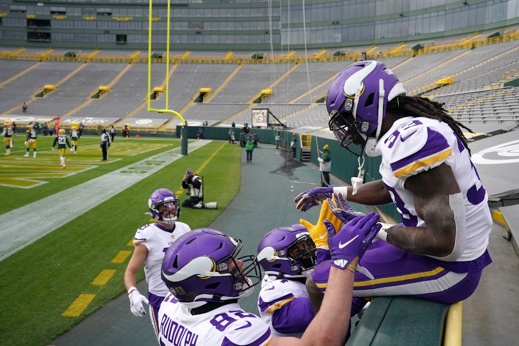 Vikings running back Dalvin Cook did the Lambeau Leap into an empty stadium after scoring one of his four touchdowns in Green Bay last season.