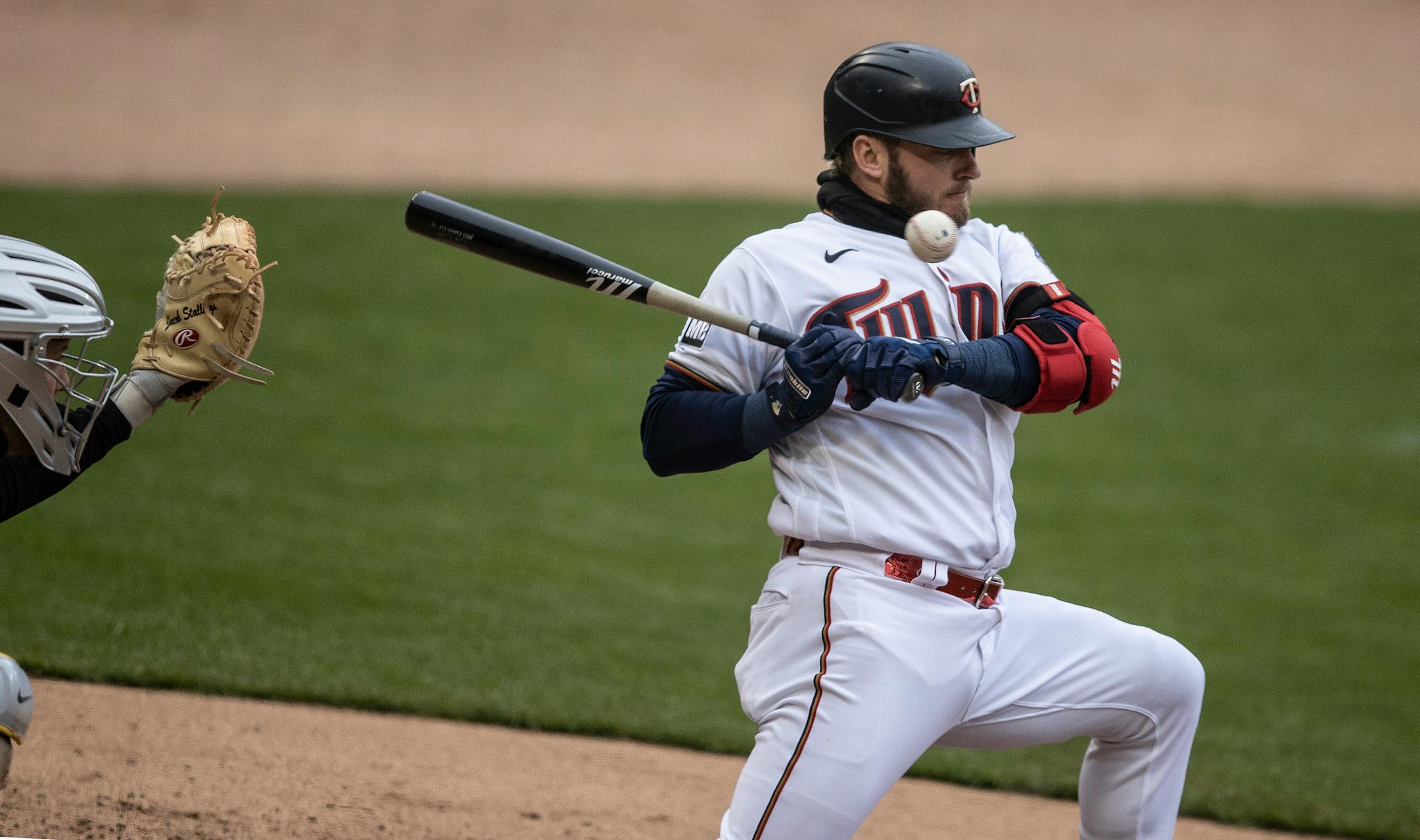 Minnesota Twins third baseman Josh Donaldson (20) avoid getting hit by a pitch in the second inning.