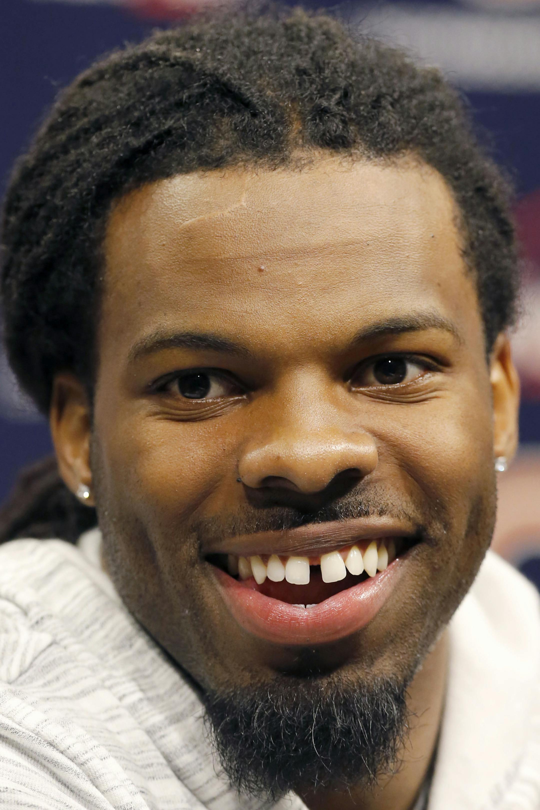 Chicago Bears' Kevin White smiles during a news conference after an NFL football rookie minicamp Friday, May 8, 2015, in Lake Forest, Ill. (AP Photo/Charles Rex Arbogast)
