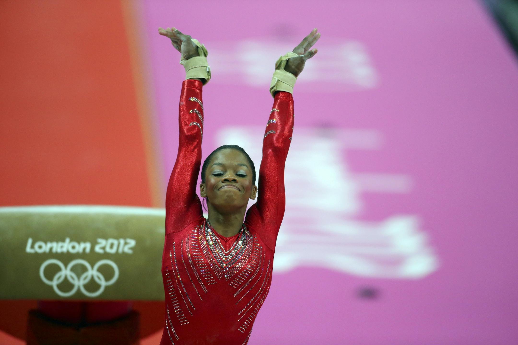 Gabrielle Douglas, of the U.S., during the vault portion of the women's team all-around competition in gymnastics at the 2012 Summer Games in London, July 31, 2012.