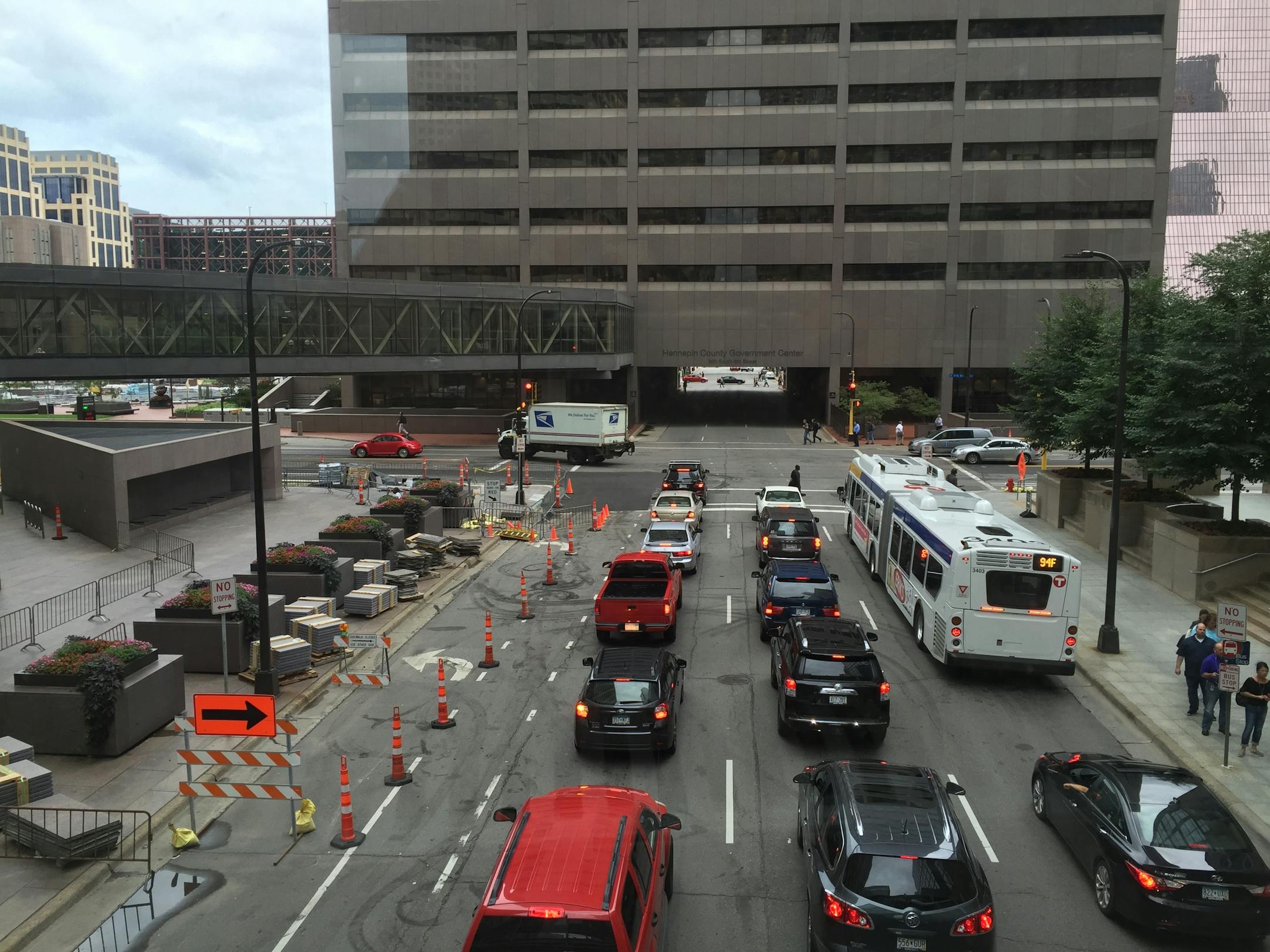 Traffic on Friday night in downtown Minneapolis, on 6th Street near 3rd Avenue S.