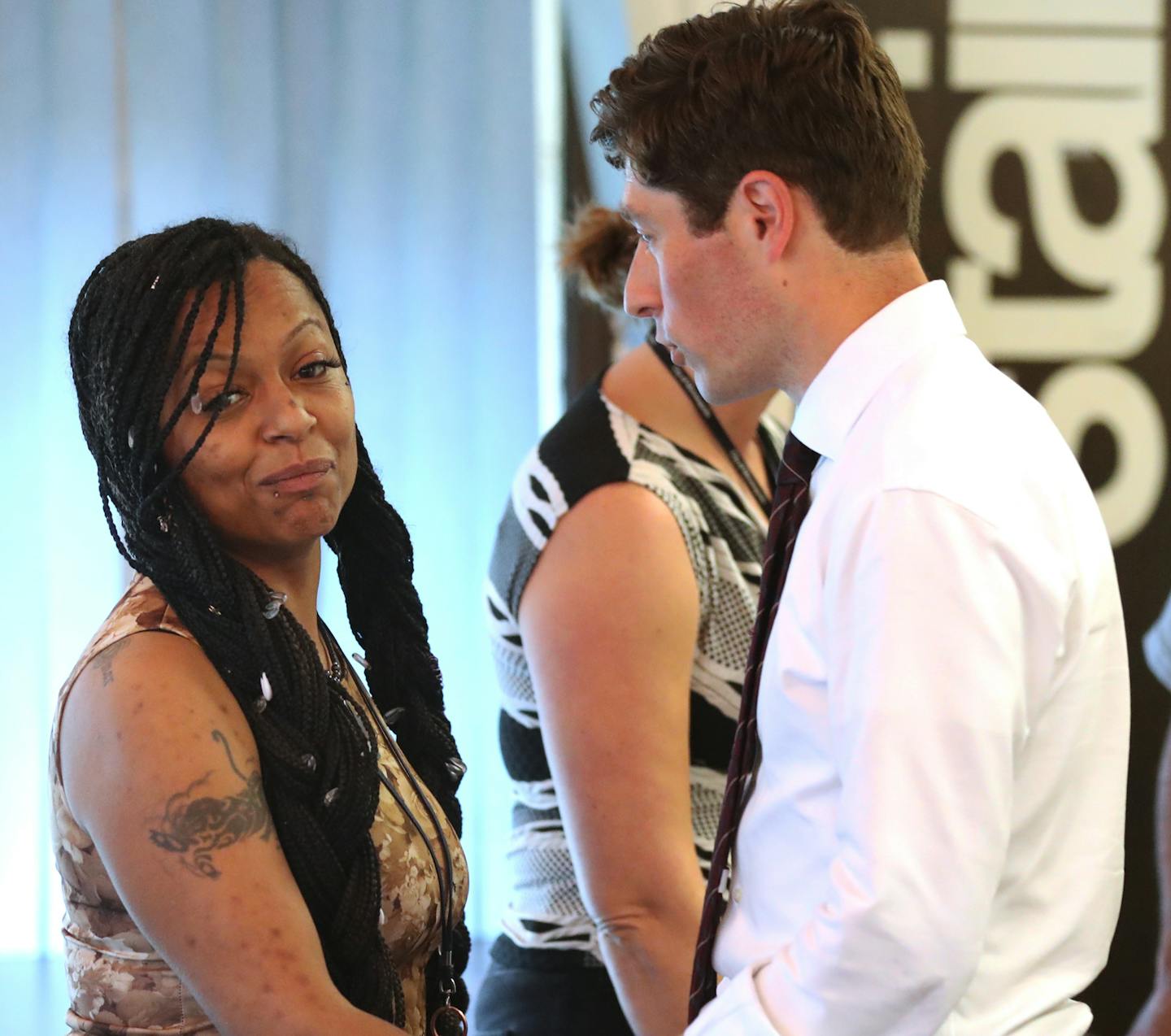 Following a meeting with tenants of landlord Mahmood Khan, tenant Tecara Ayler turns away during a brief conversation with Minneapolis Mayor Jacob Frey at NorthPoint Health Wellness Center Friday June 1, 2018, in Minneapolis, MN.] DAVID JOLES &#x2022; david.joles@startribune.com Tenants in the more than 30 north Minneapolis homes owned by discredited landlord Mahmood Khan are meeting with Mayor Jacob Frey today asking him to press Hennepin County Courts to declare a moratorium to allow them to s