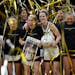 Iowa guard Caitlin Clark (22) received a commemorative basketball after defeating Michigan and breaking the NCAA women's career scoring record on Thur