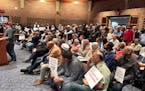 Hundreds of supporters and opponents of a proposed housing development with a mosque attended a Lino Lakes City Council meeting on April 22.
