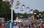 People attend the Iowa State Fair, Thursday, Aug. 11, 2016, in Des Moines, Iowa. (Kelsey Kremer/The Des Moines Register via AP)