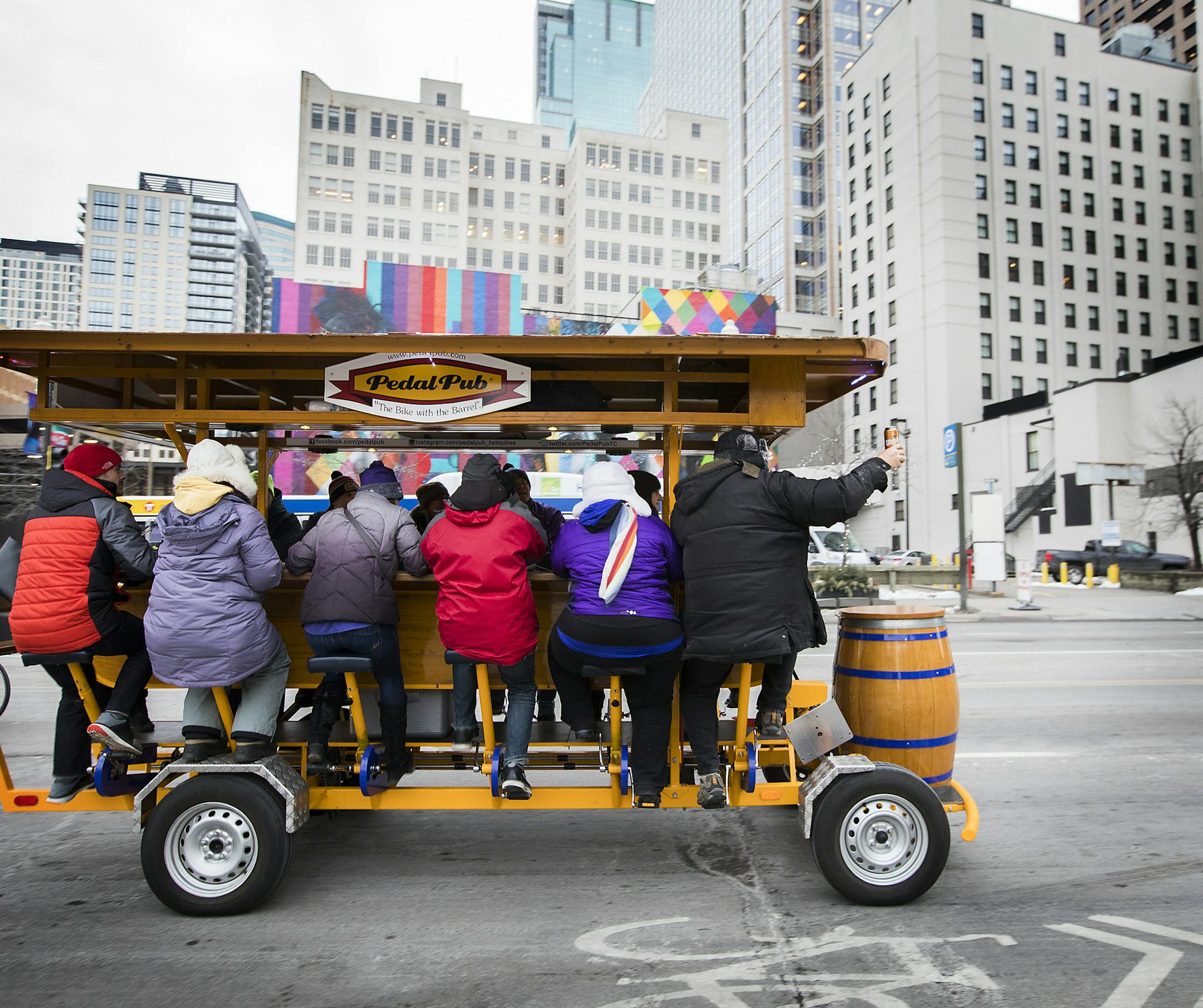 The Pedal Pub goes for the first of their special winter rides for Super Bowl week. ] LEILA NAVIDI &#xef; leila.navidi@startribune.com BACKGROUND INFORMATION: Pedal Pub goes for the first of their special winter rides for Super Bowl week on Tuesday, January 30, 2018 in downtown Minneapolis.