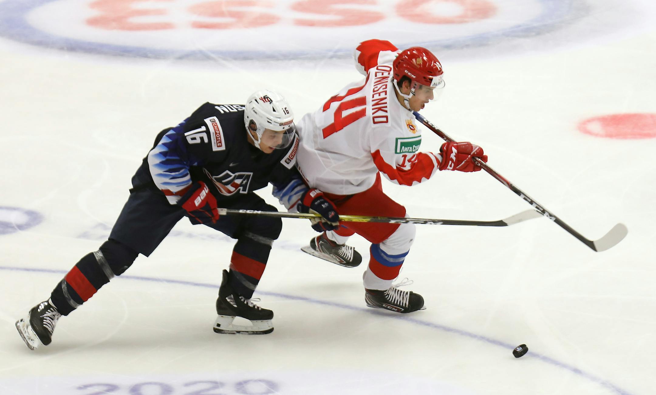 From left Nick Robertson of the United States and Grigoriy Denisenko of Russia during the 2020 IIHF World Junior Ice Hockey Championships Group B match between USA and Russia in Ostrava, Czech Republic, on December 29th, 2019. (Petr Sznapka/CTK via AP)