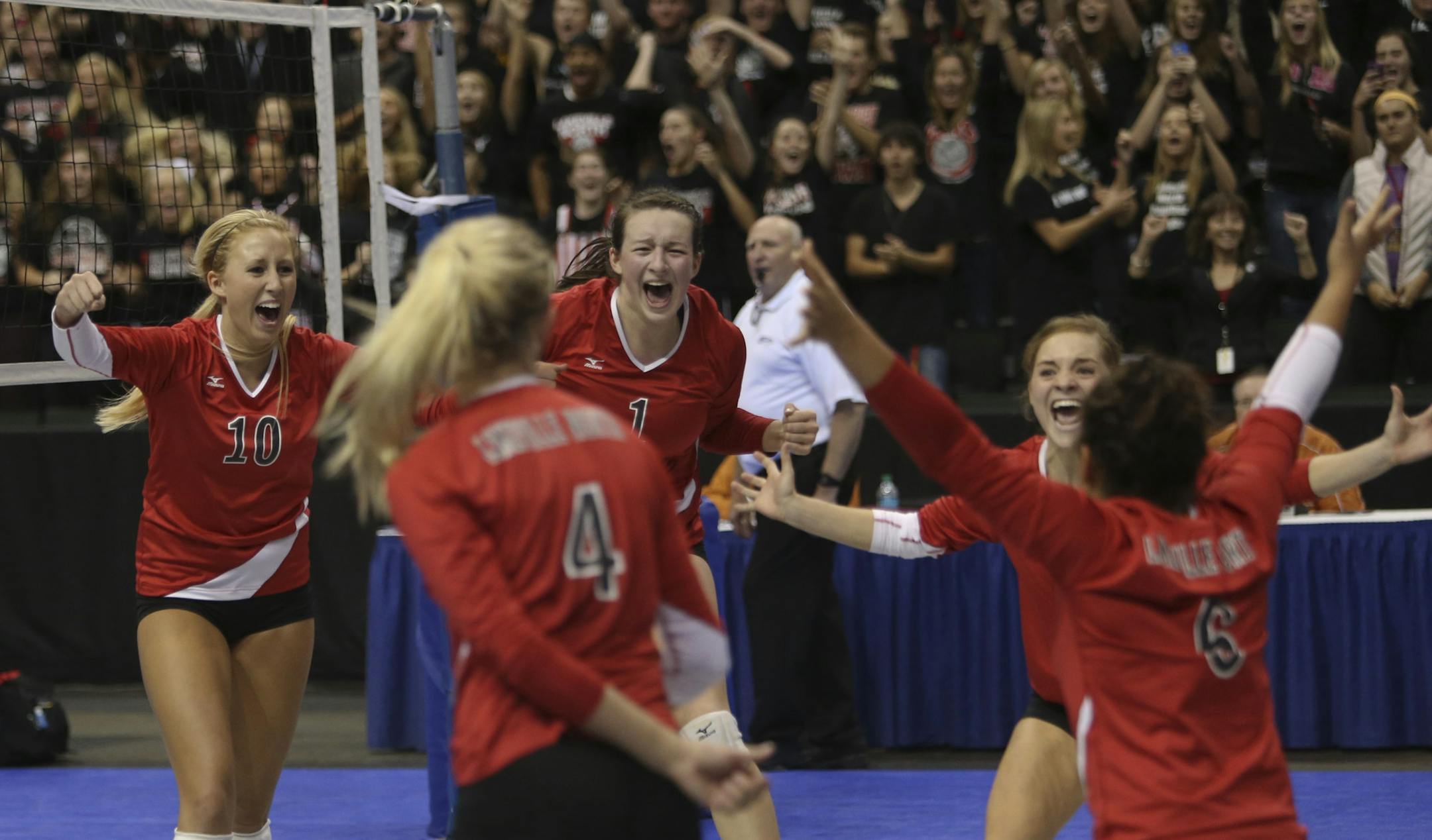 Lakeville North's celebrated after winning in the Class AAA volleyball finals at Xcel Energy Center in St. Paul, Min., Saturday November 10, 2012. Lakeville North won 3-1 over Eden Prairie for the title. ] (KYNDELL HARKNESS/STAR TRIBUNE) kyndell.harkness@startribune.com ORG XMIT: MIN1211102013559284