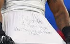 Minnesota Vikings defensive end Everson Griffen (97) pulled his shirt from under his jersey with a message about the birth of is son after sacking Det