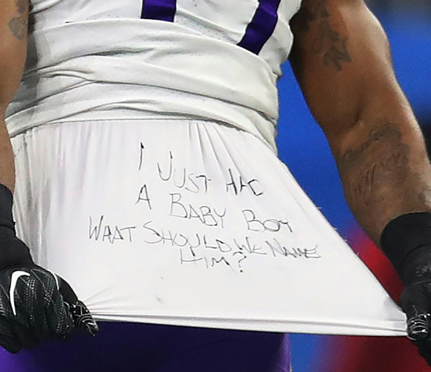 Minnesota Vikings defensive end Everson Griffen (97) pulled his shirt from under his jersey with a message about the birth of is son after sacking Detroit Lions quarterback Matthew Stafford (9) at Ford Field Thursday November 23, 2017 in Detroit , MI.] The Detroit Lions hosted the Minnesota Vikings Thanksgiving Day.JERRY HOLT &#xef; jerry.holt@startribune.com