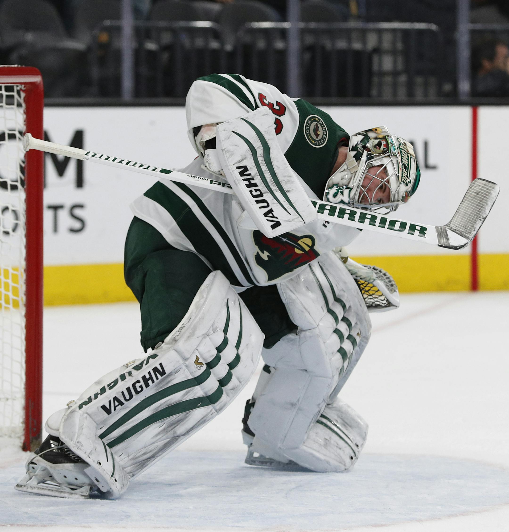 Minnesota Wild goaltender Alex Stalock celebrates after a teammate scored against the Vegas Golden Knights during the third period of an NHL hockey game Friday, March 16, 2018, in Las Vegas. The Wild won 4-2. (AP Photo/John Locher)