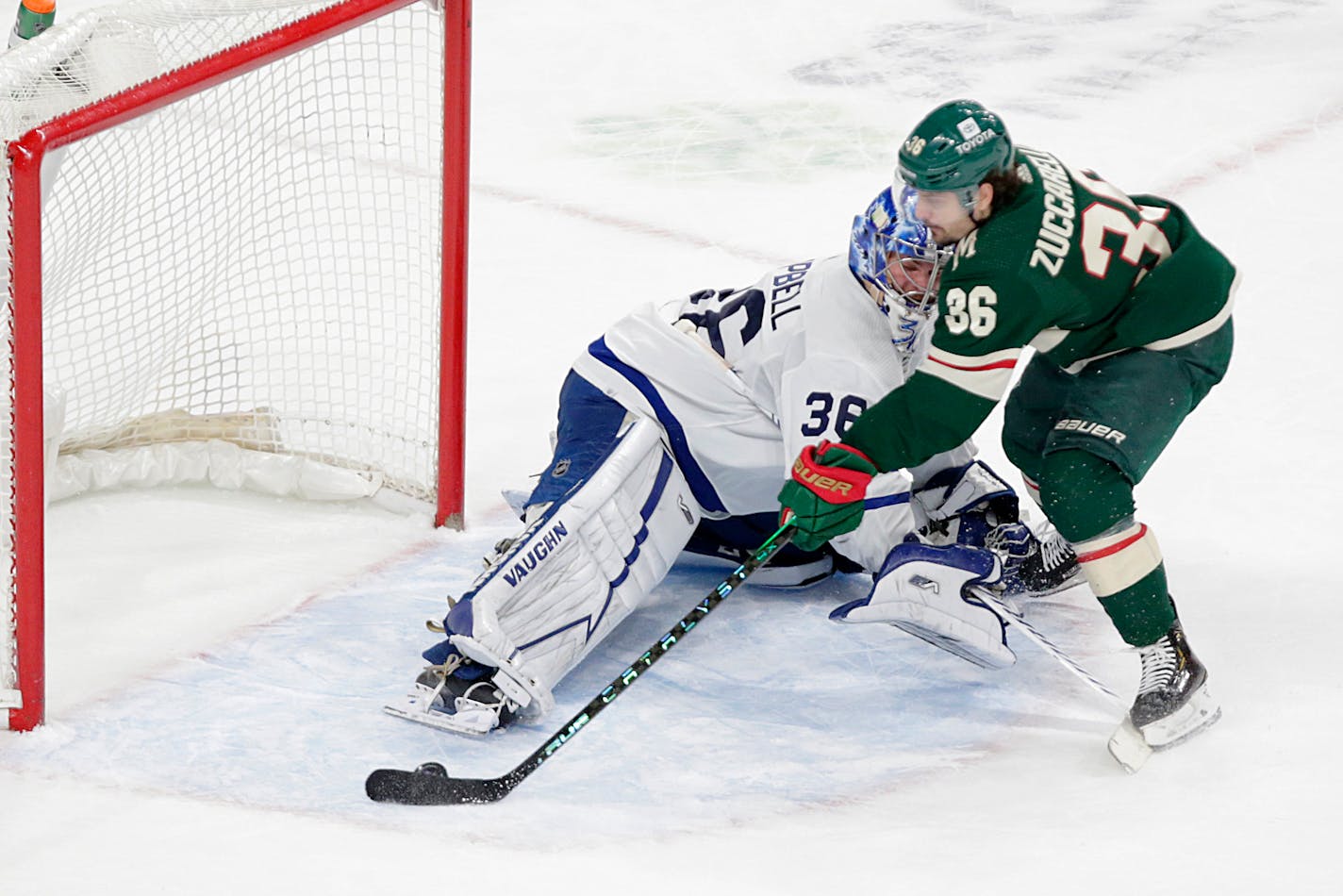 Minnesota Wild right wing Mats Zuccarello (36) scores on Toronto Maple Leafs goaltender Jack Campbell (36) during the shoot out of an NHL hockey game, Saturday, Dec. 4, 2021, in St. Paul, Minn. (AP Photo/Andy Clayton-King)