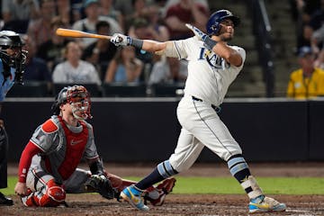 The Rays' Jonathan Aranda watches his three-run home run off Twins pitcher Brock Stewart during the sixth inning Monday.