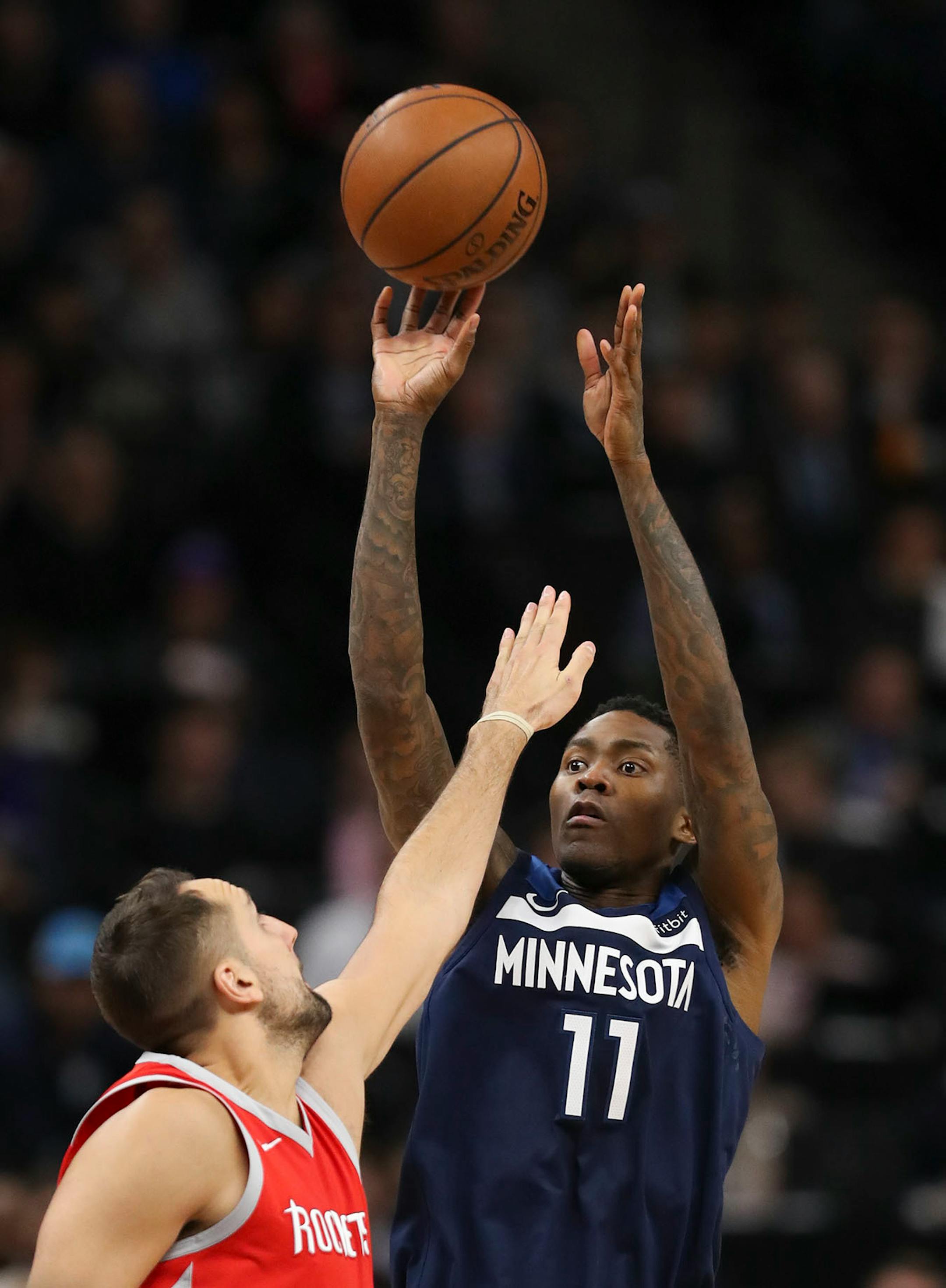 Minnesota Timberwolves guard Jamal Crawford (11) shot over Houston Rockets forward Ryan Anderson (33) in the third quarter. He finished with 20 points.