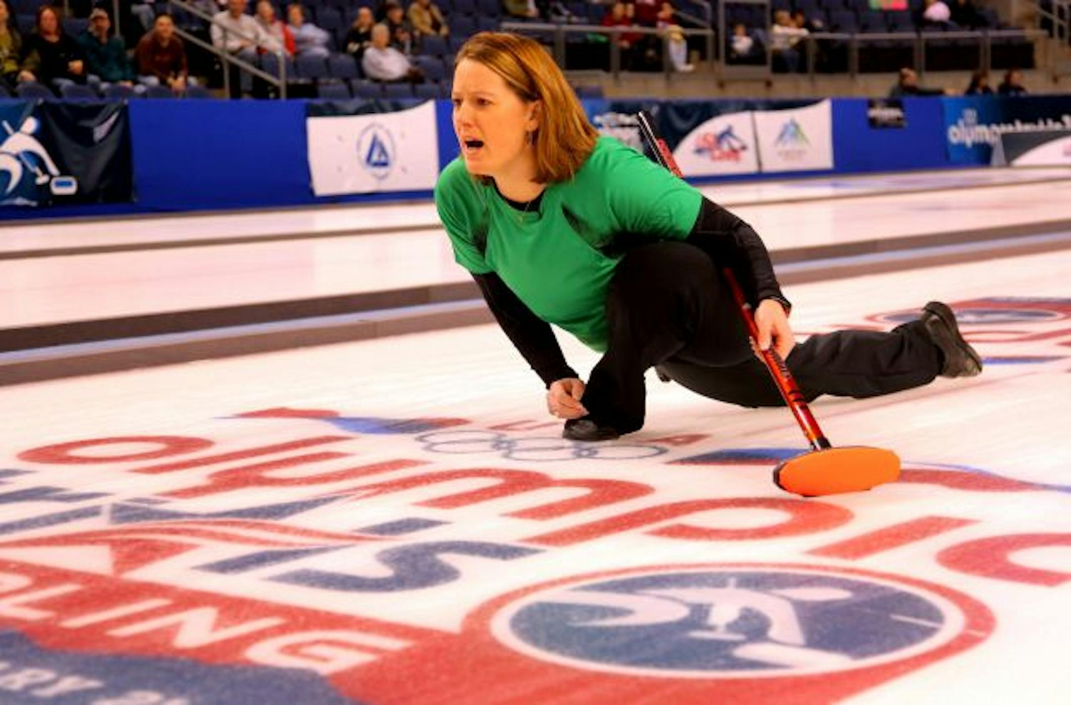 Debbie McCormick followed through as she delivered a stone against Team Patti Lank in the Women's US Curling Olympic Trials Finals on Saturday.