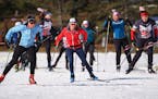 Jessie Diggins (center in Red), the Olympic Gold Medal winning cross country skier from Stillwater, skied with local high school skiers at Theodore Wi
