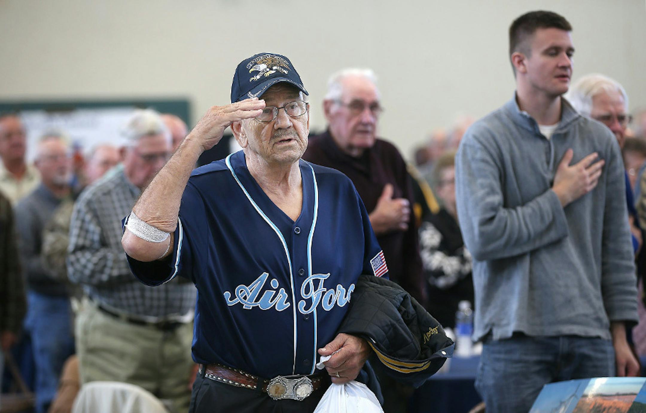 Virgil Marble, who served in the Air Force from 1960-1966, saluted the Color Guard as as they made their way into the Standdown for Veterans event at the Mankato National Guard Armory, Tuesday, November 10, 2015 in Mankato, MN. About 500 veterans were expected to attend the all-day event.