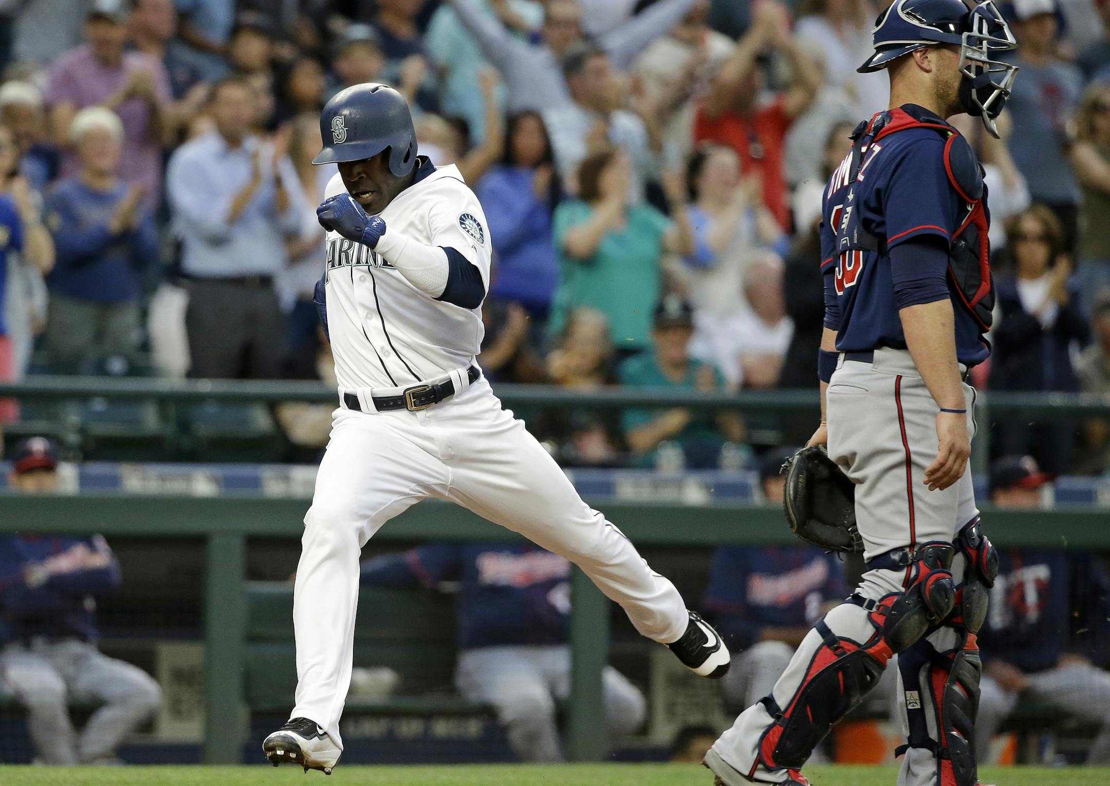 Seattle’s Guillermo Heredia scored on Danny Valencia’s three-run double in the fourth, a hit that boosted the Mariners’ lead to 8-2.