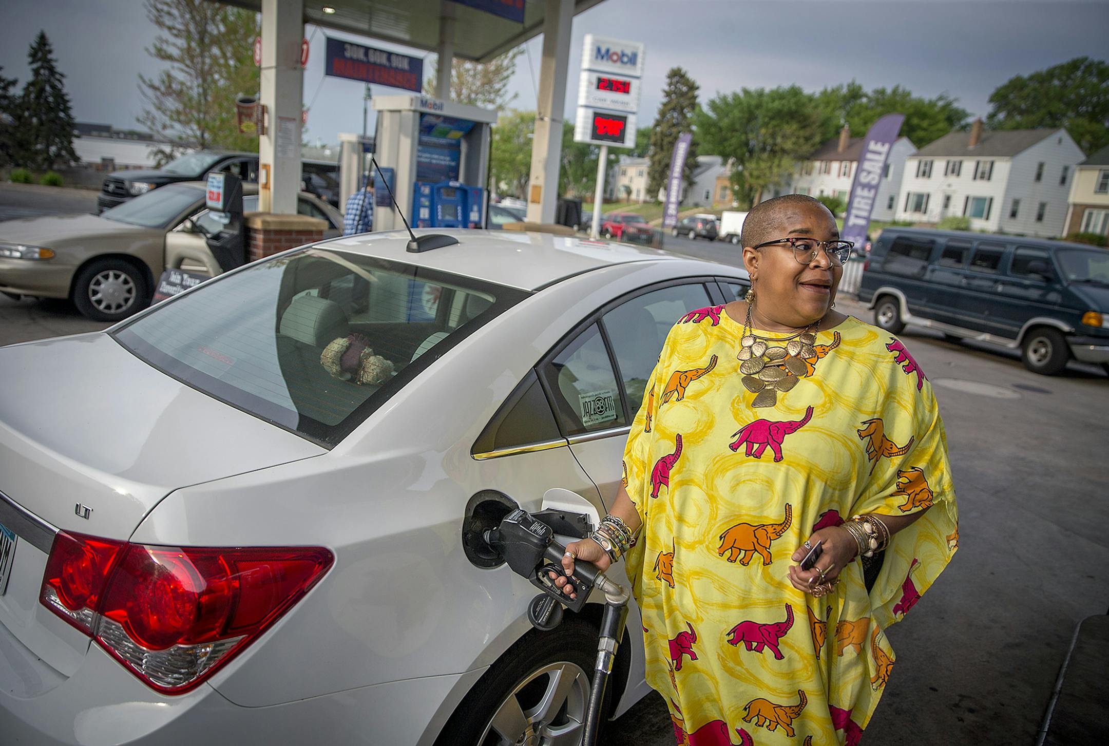 "It's just a part of life and it cost more in California," said Akhmiri Sekhr-ra, about increasing gas prices as she filled her car up with gas at a Bobby and Steve's gas station in Minneapolis on Wednesday.