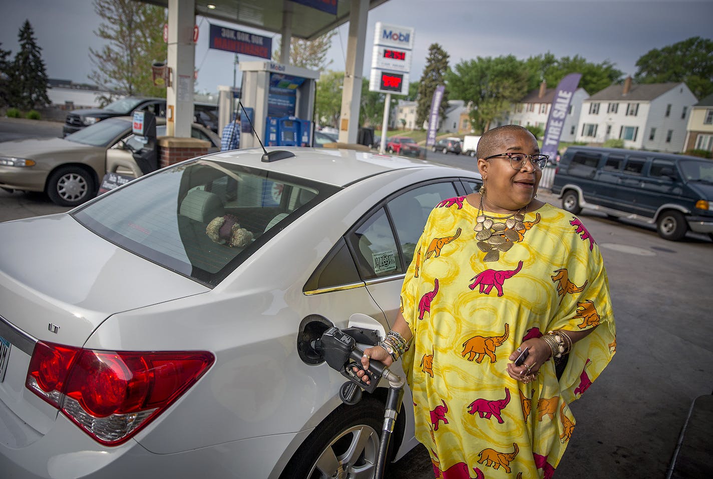 "It's just a part of life and it cost more in California," said Akhmiri Sekhr-ra, about increasing gas prices as she filled her car up with gas at a Bobby and Steve's gas station in Minneapolis on Wednesday.