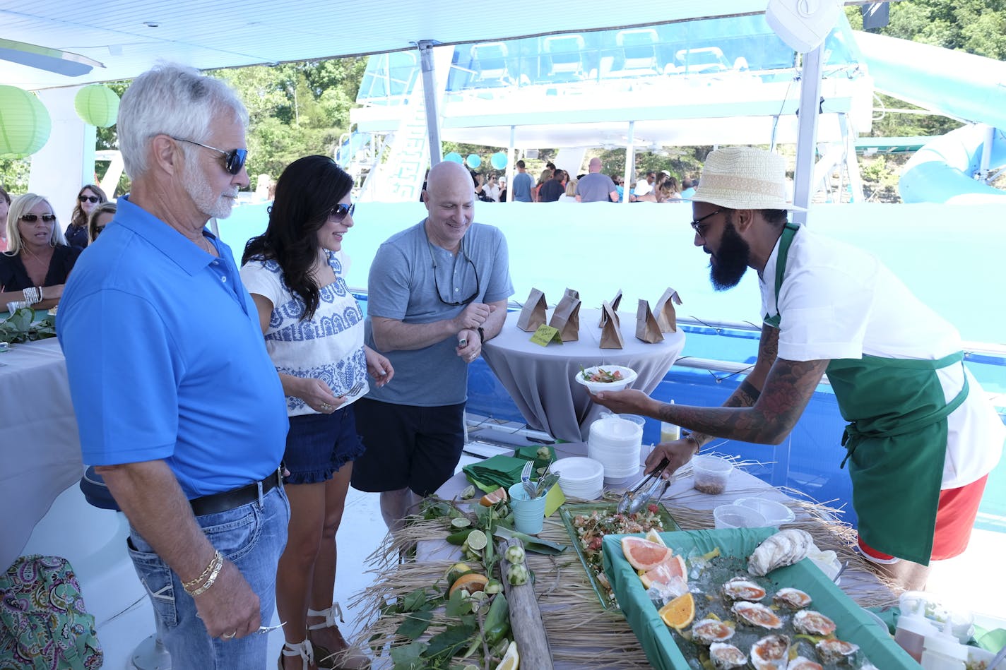 Minnesota's Justin Sutherland serves his dish to the judges on 'Top Chef.' ORG XMIT: Season:16