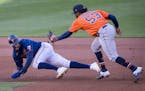 Twins pinch runner Byron Buxton was tagged out in a rundown by Astros pitcher Cristian Javier in the eighth inning.