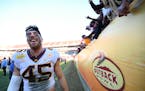 Gophers linebacker Carter Coughlin (45) was all smiles as he walked off the field following his team's 31-24 victory over Auburn in the Outback Bowl o