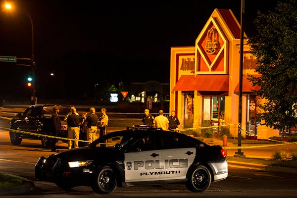 In this file photo, police responded to an officer-involved shooting at an Arby's in Plymouth on Thursday, July 23, 2015.