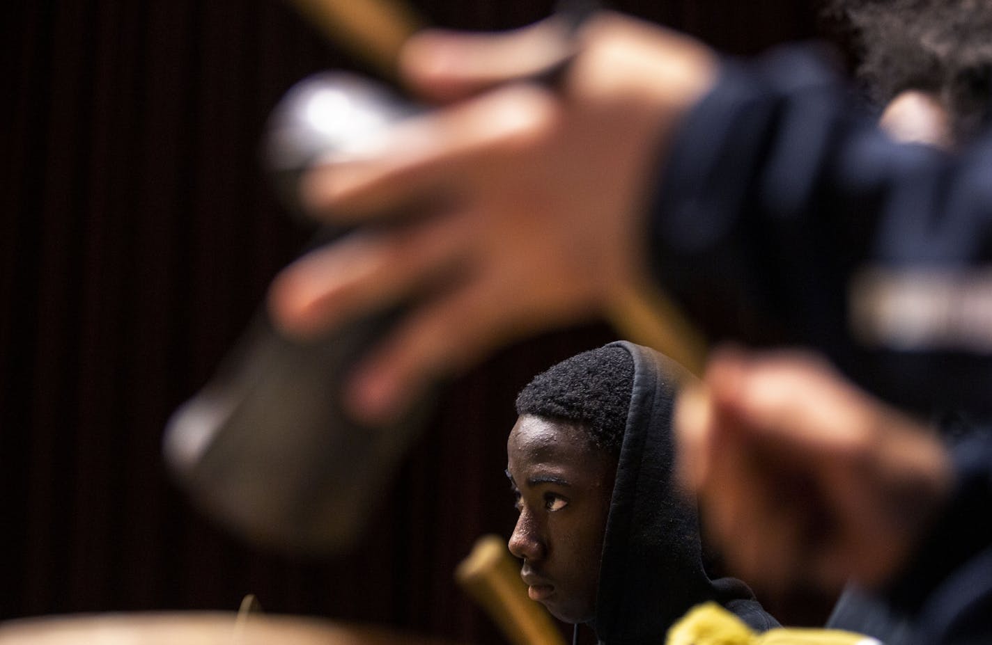 Tarnue David practices African drumming. ] NICOLE NERI &#x2022; nicole.neri@startribune.com BACKGROUND INFORMATION: During an African drumming lesson through Trio Educational Talent Search at Hennepin Technical College in Brooklyn Park, MN Tuesday, July 2, 2019.