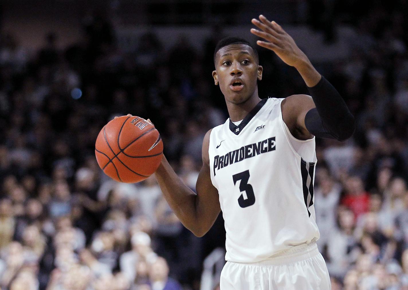 This Feb. 13, 2016 photo shows Providence guard Kris Dunn (3) during the first half of an NCAA college basketball game against Georgetown in Providence, R.I. Dunn is expected to be one of the top upperclassmen selected in the NBA draft on Thursday, June 23, 2016. (AP Photo/Stew Milne)