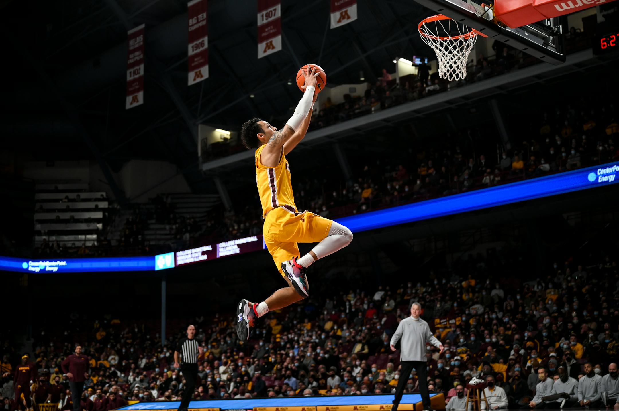 Minnesota Gophers guard Payton Willis (0) dunks the ball off a fast break in the first half during an NCAA men's basketball game between Minnesota and Purdue at Williams Arena in Minneapolis, Minn.