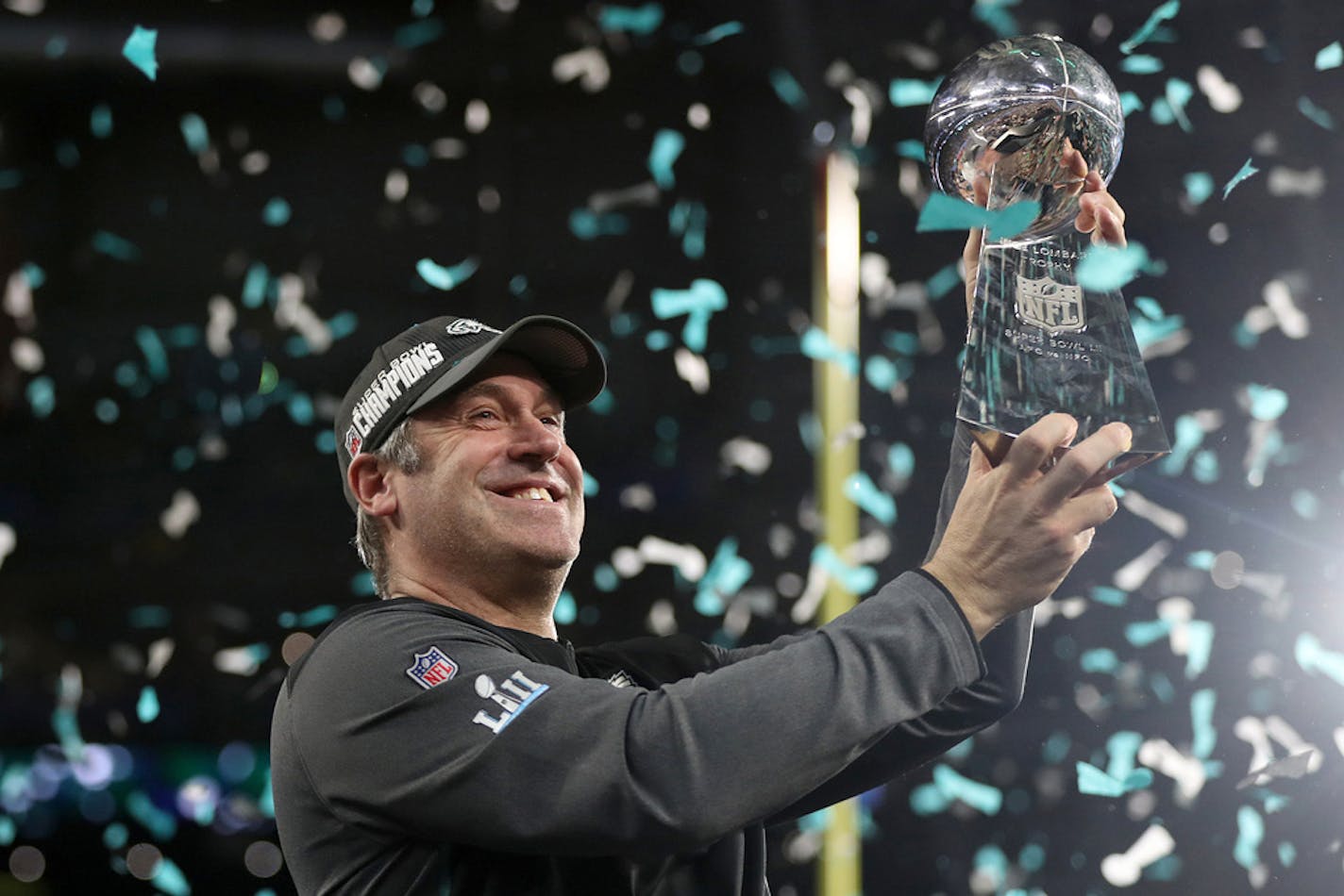 Philadelphia Eagles head coach Doug Pederson hoists up the Lombardi trophy during the ceremony after Super Bowl LII on Sunday, Feb. 4, 2018 at U.S. Bank Stadium in Minneapolis, Minn. The Eagles beat the New England Patriots, 41-33. (Tim Tai/Philadelphia Inquirer/TNS) ORG XMIT: 1222933 ORG XMIT: MIN1802051603092882