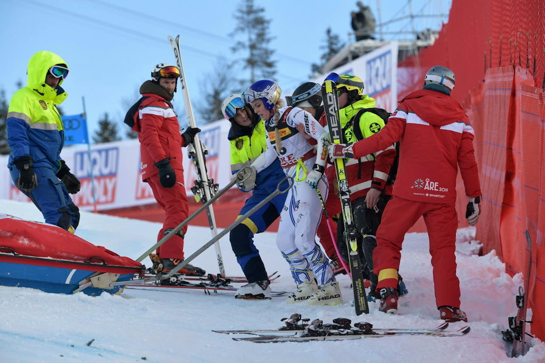 United States' Lindsey Vonn is assisted after crashing during the women's super G at the alpine ski World Championships, in Are, Sweden, Tuesday, Feb. 5, 2019. (Pontus Lundahl/TT via AP)
