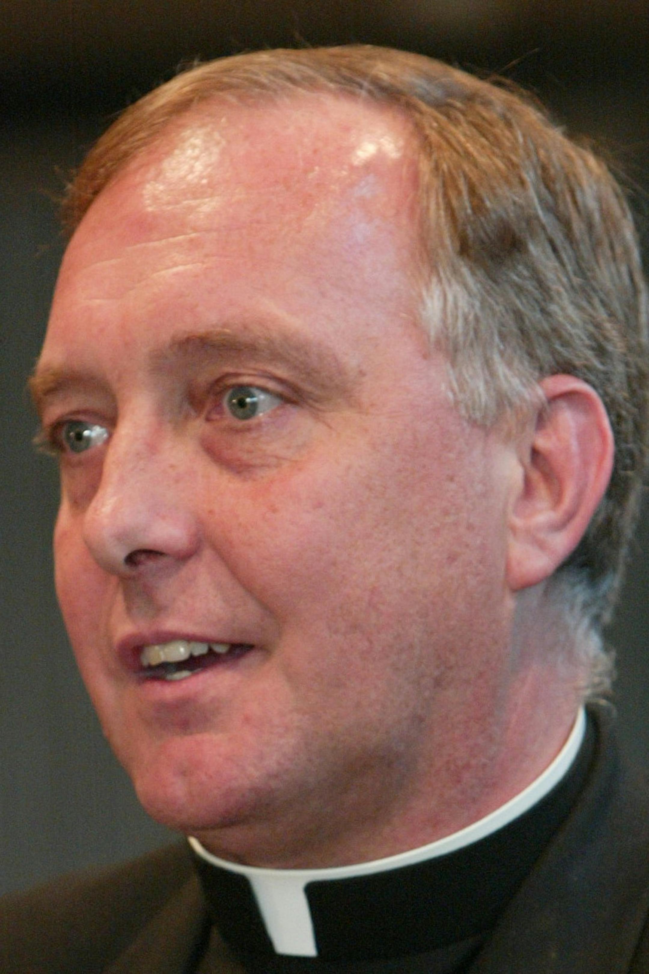 GENERAL INFORMATION: ST. PAUL, MN - 5/7/02 - TUE - Bishop Richard E. Pates and Vicar General Fr. Kevin McDonough will hold a press conference to disclose details of new allegations of clergy sex abuse in the Archdiocese of St. Paul and Minneapolis. IN THIS PHOTO: Vicar General Fr. Kevin McDonough held a press conference to disclose details of new allegations of clergy sex abuse in the Archdiocese of St. Paul and Minneapolis. McDonough did all the talking.