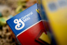 General Mills Inc. brand cereals are displayed for a photograph in New York, U.S., on Monday, June 25, 2012. General Mills Inc., the maker of Cheerios