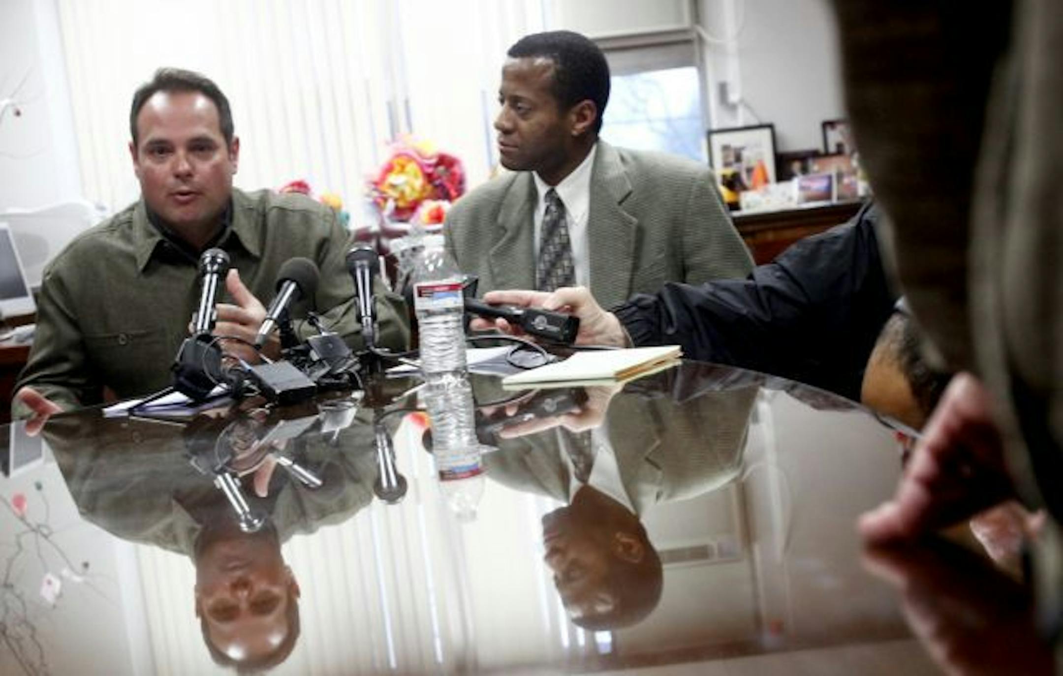 Minneapolis police Sgt. Jesse Garcia, left, and Minneapolis Schools communications director Stan Alleyne, address media members during a press conference at Minneapolis Public Schools Office.
