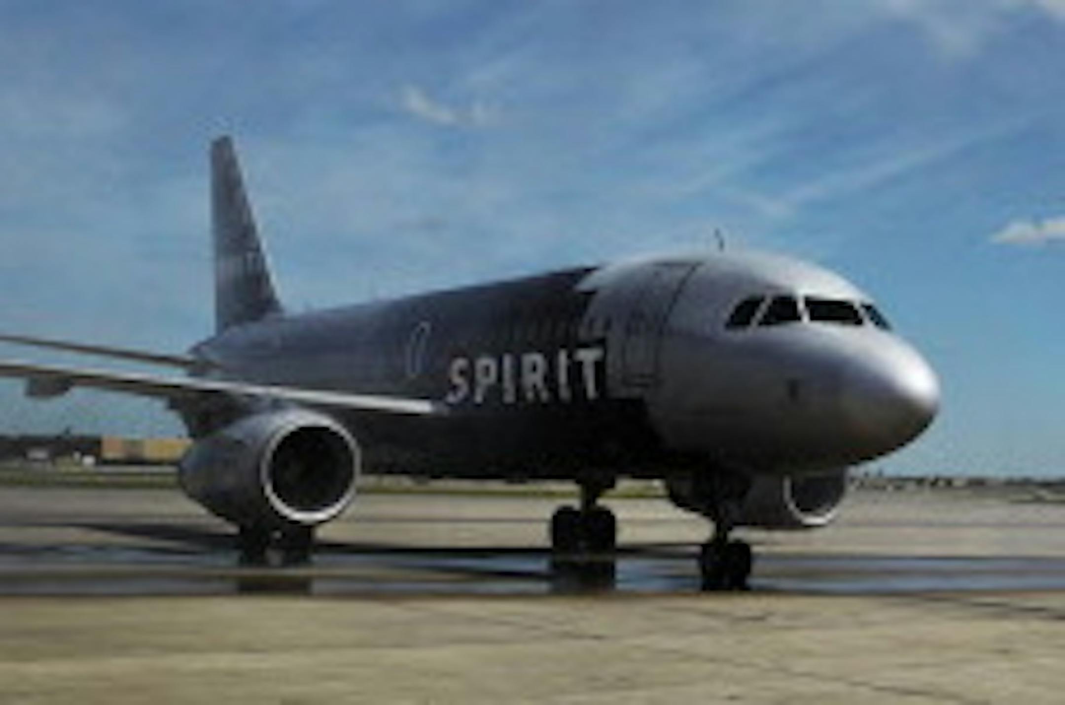 A Spirit Airlines jet arrives from Chicago to a "water salute" from an airport firetruck at MSP-terminal 2, after launching service with flights to Las Vegas and Chicago out of Minneapolis-St. Paul International Airport this week.] (DAVID JOLES/STARTRIBUNE) djoles@startribune.com Friday, June 1, 2012, in , Minneapolis MN. Spirit Airlines launches flights to Las Vegas and Chicago out of Minneapolis-St. Paul International Airport this week. ORG XMIT: MIN2013090612294421